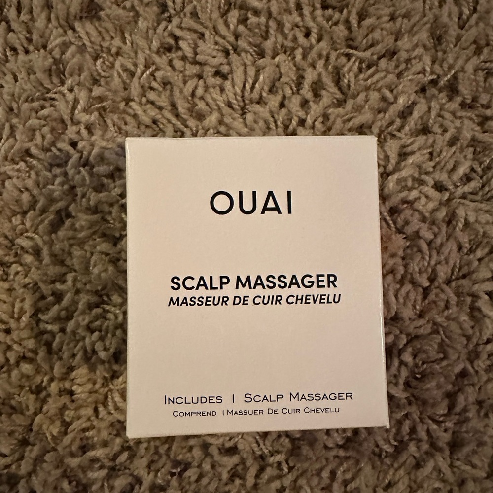 Ouai scalp massager.  New in box.